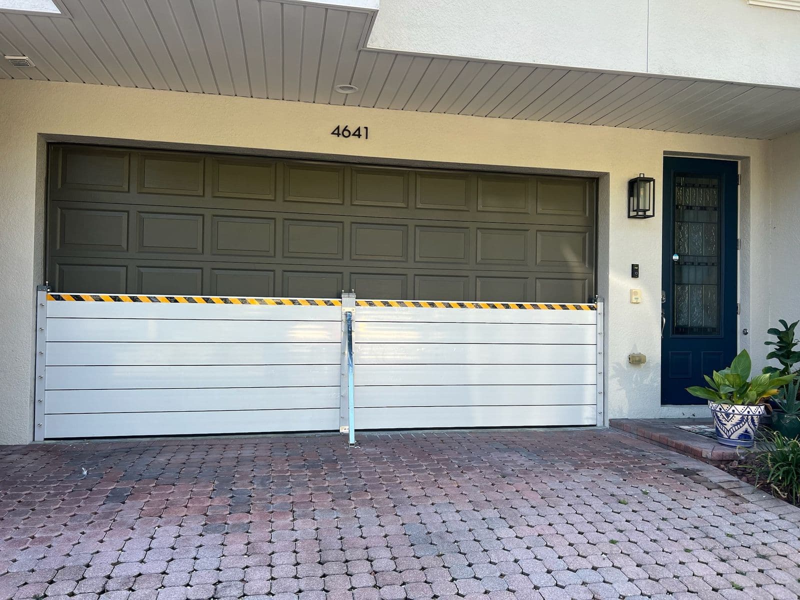Flood barriers spanning a two-car garage in St. Petersburg
